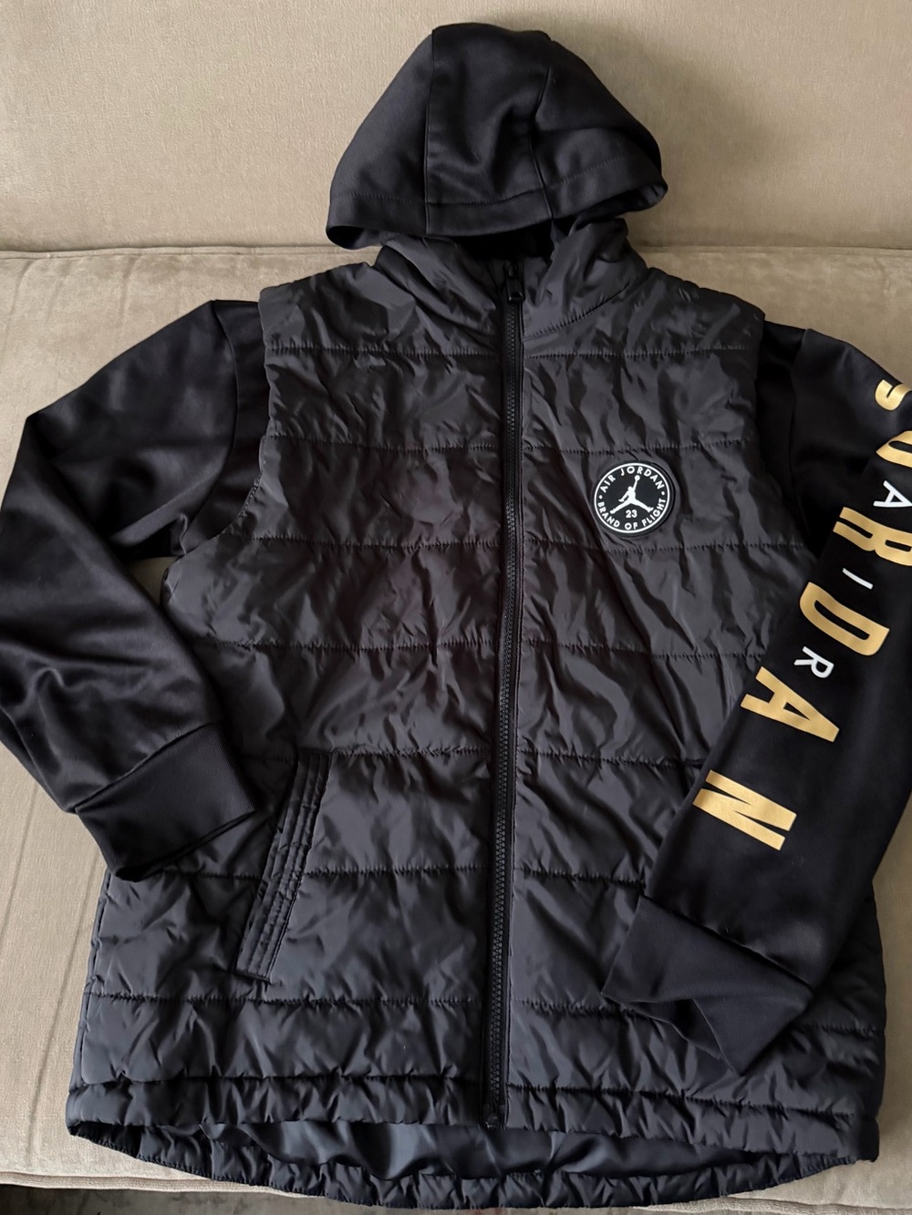Jordan Black Hooded Puffer Jacket with Gold Sleeve Branding